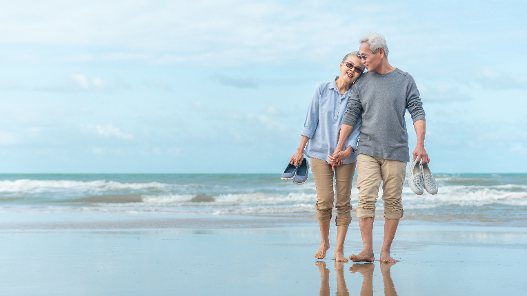 Aging couple on the beach
