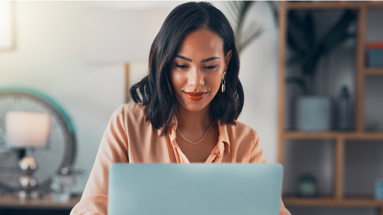 Woman viewing her laptop.