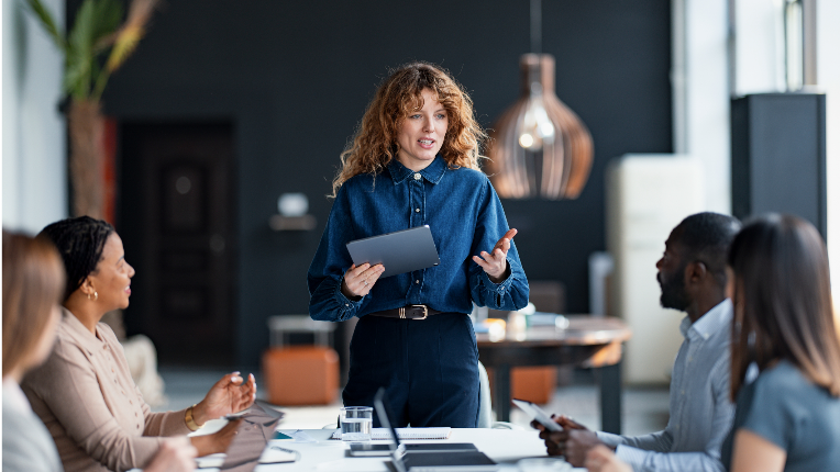 Businesswoman presenting in a meeting.